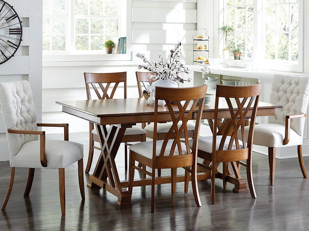The Crown Point Modern Farmhouse Dining Set is a great example of mixing and matching similar styles to create a new, cohesive look.