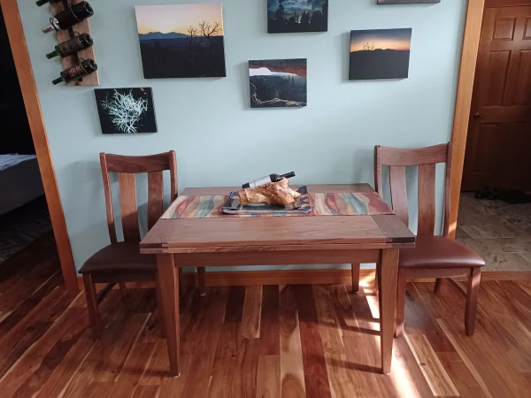 Picture of Athol Pivot Table and Collbran Dining Chairs, reviewed by Dan and Chris
